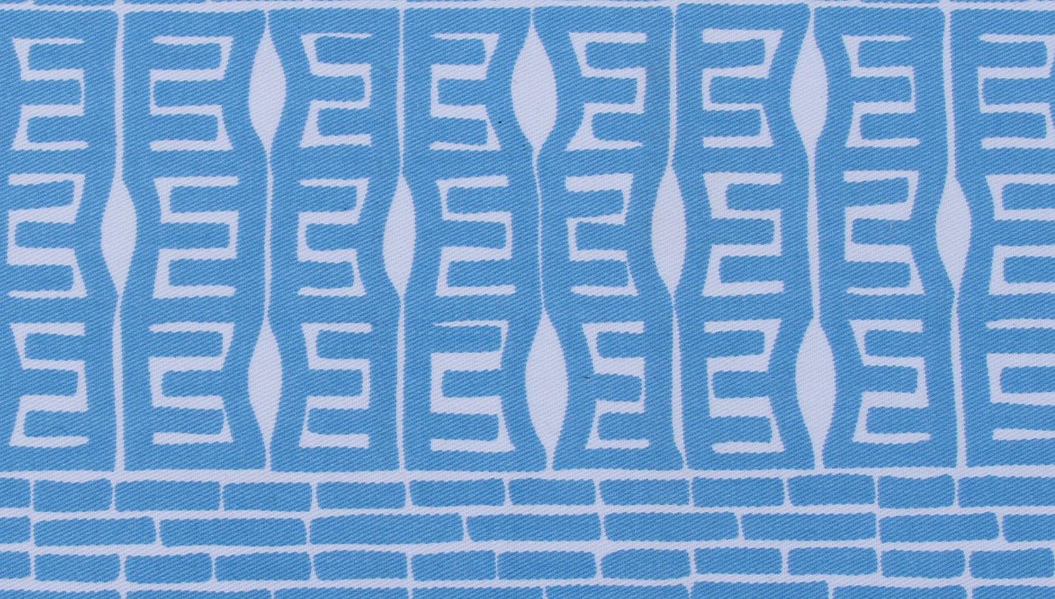 organic cotton fabric close up in blue geometric pattern