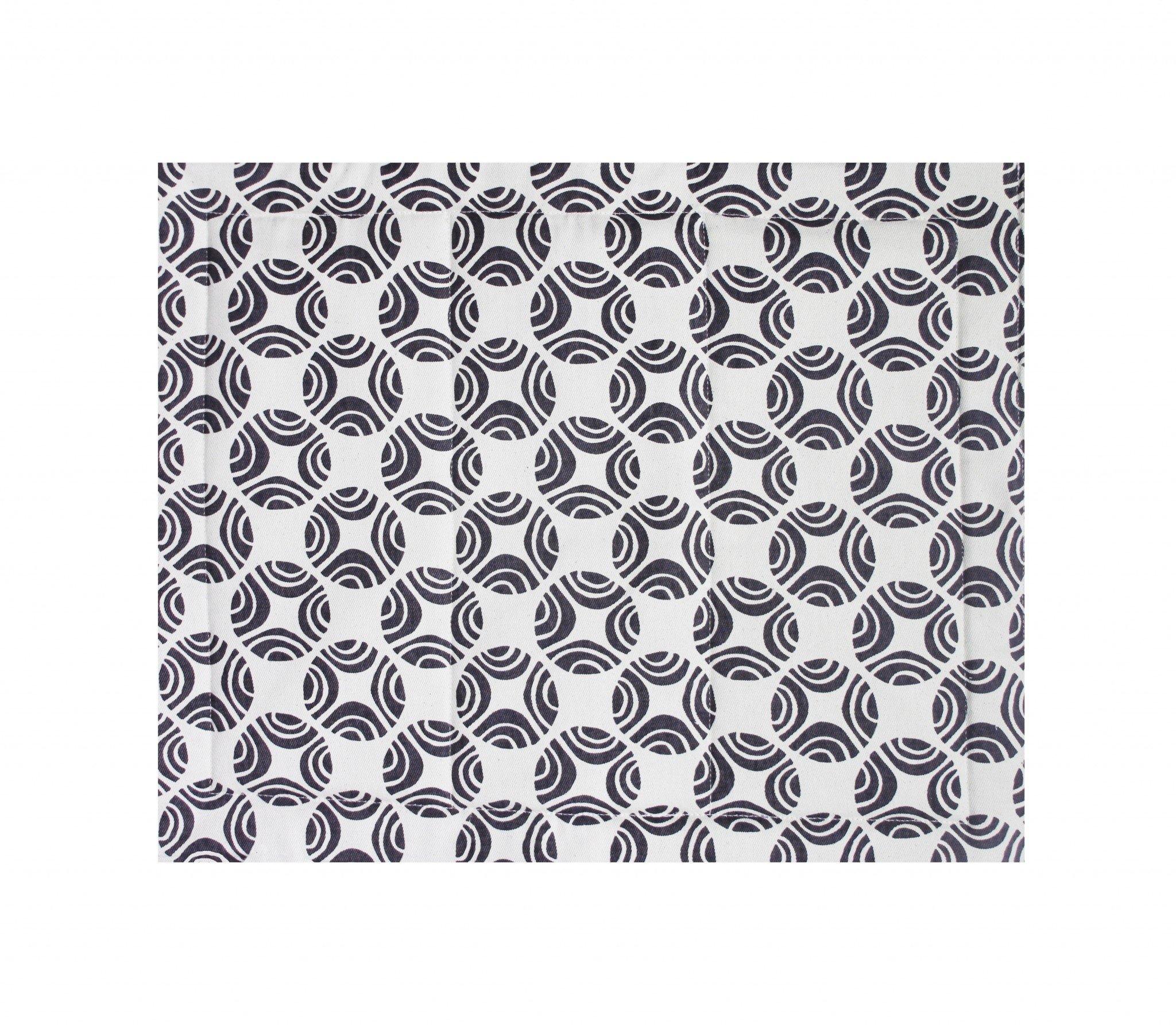 organic cotton fabric close up black and white picasso pattern