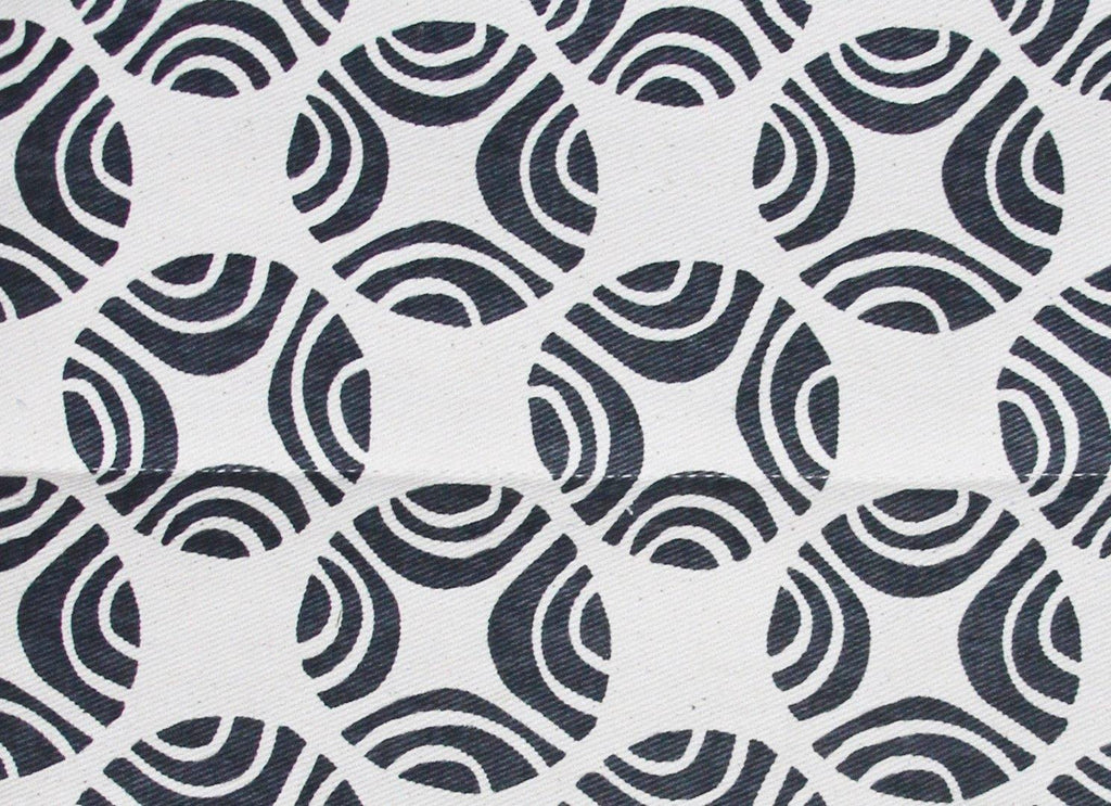 organic cotton fabric close up black and white picasso pattern