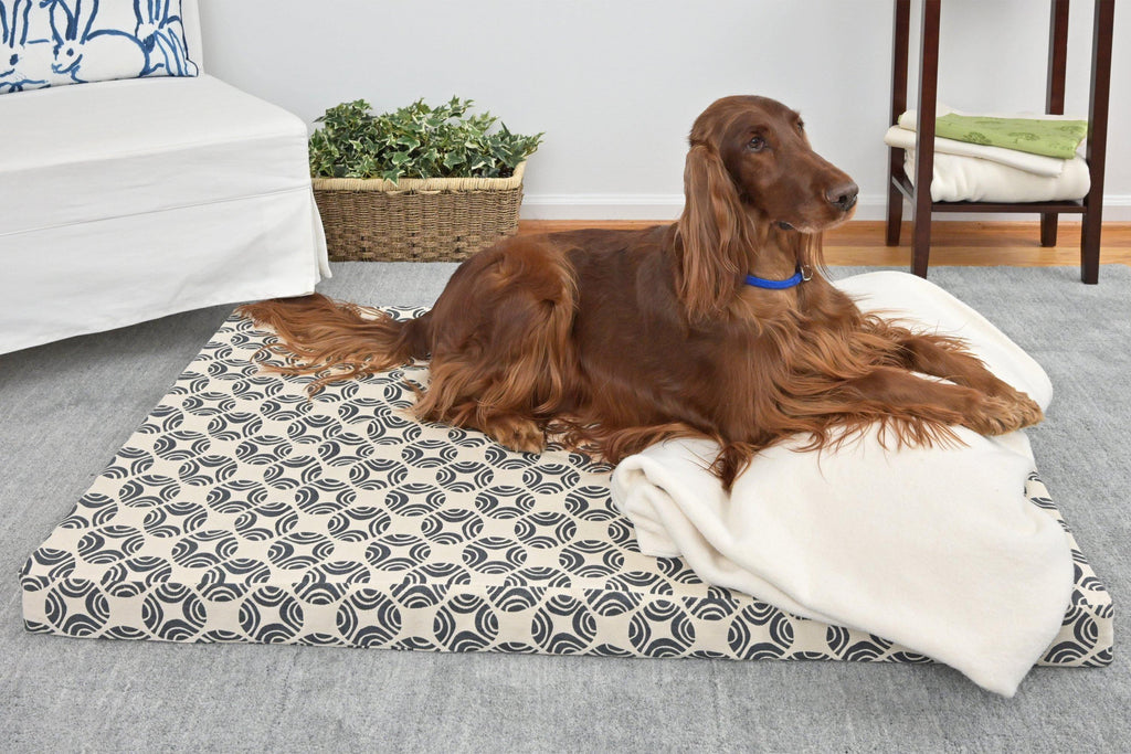 brown dog laying on organic cotton dog bed cover picasso denim