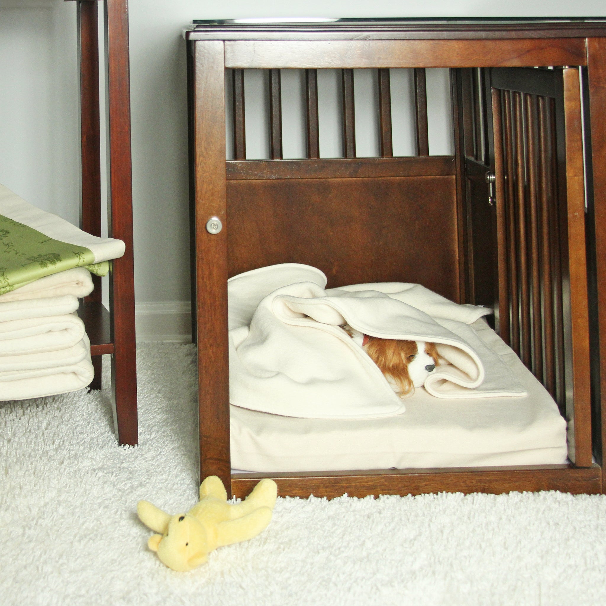 Puppy Sleeping in a crate with organic cotton mat and blanket