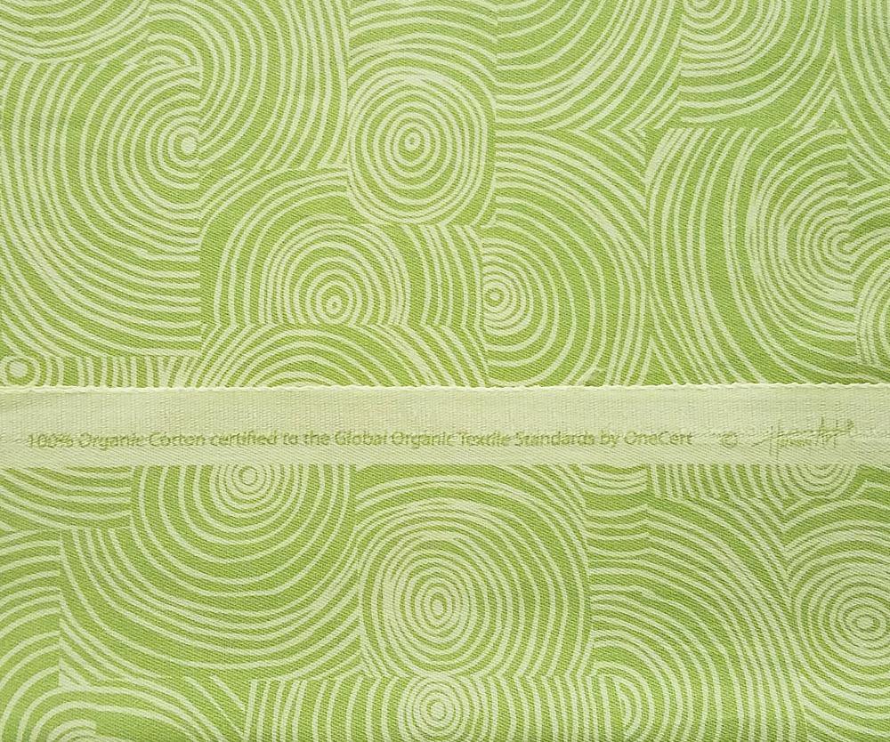 GOTS certified lime colored fabric with lime swirl pattern