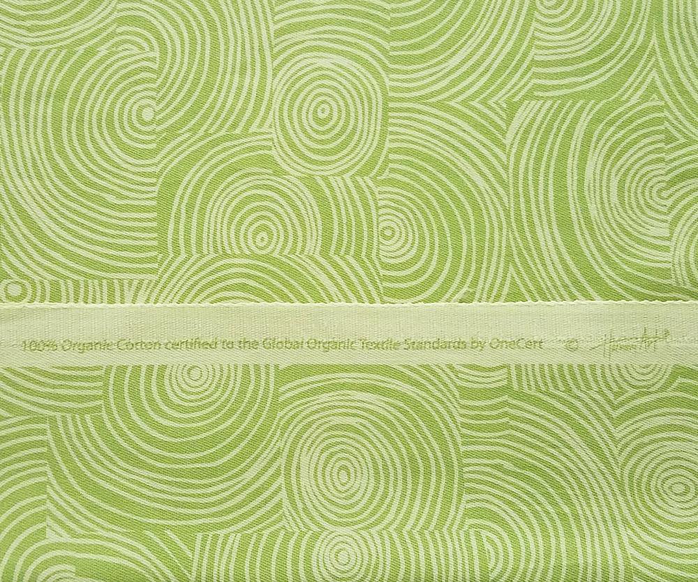 GOTS certified lime colored fabric with lime swirl pattern